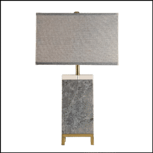O Abajur Greymarble da Lampadaria combina design sofisticado e versatilidade para ambientes clássicos e contemporâneos. Com base retangular em mármore cinza maciço, detalhes em latão e acrílico, esta peça exala elegância e exclusividade. Sua cúpula retangular translúcida em tecido linho cinza distribui a luz de forma uniforme: direciona a iluminação para cima e para baixo, criando uma atmosfera aconchegante para leitura, enquanto difunde suavemente a luz lateral, contribuindo para a iluminação geral do ambiente.