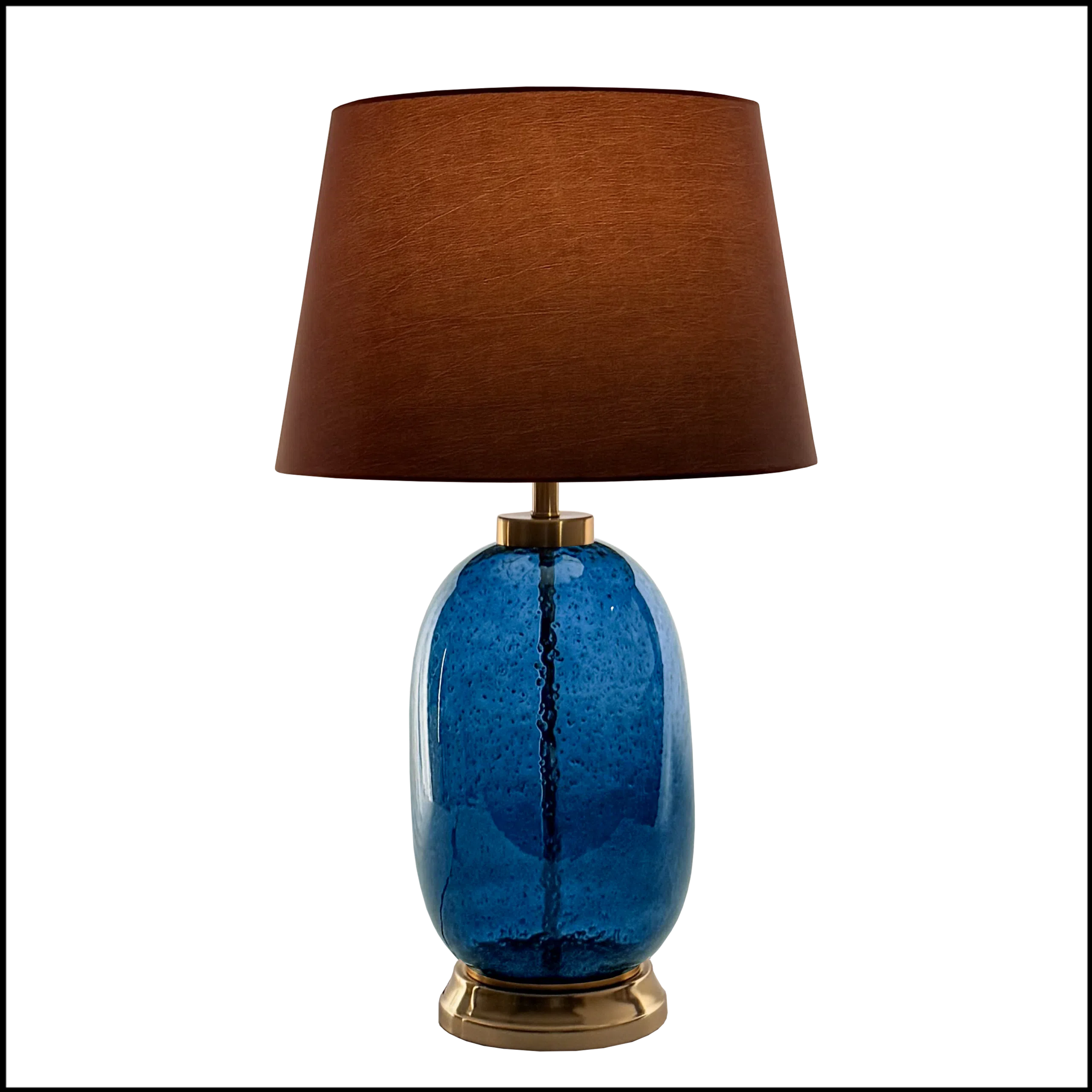 Abajur em vidro artesanal na cor azul, cada peça é única e exclusiva, com detalhes em metal bronze e pantalha opaca em tecido algodão mercerizado na cor bronze
