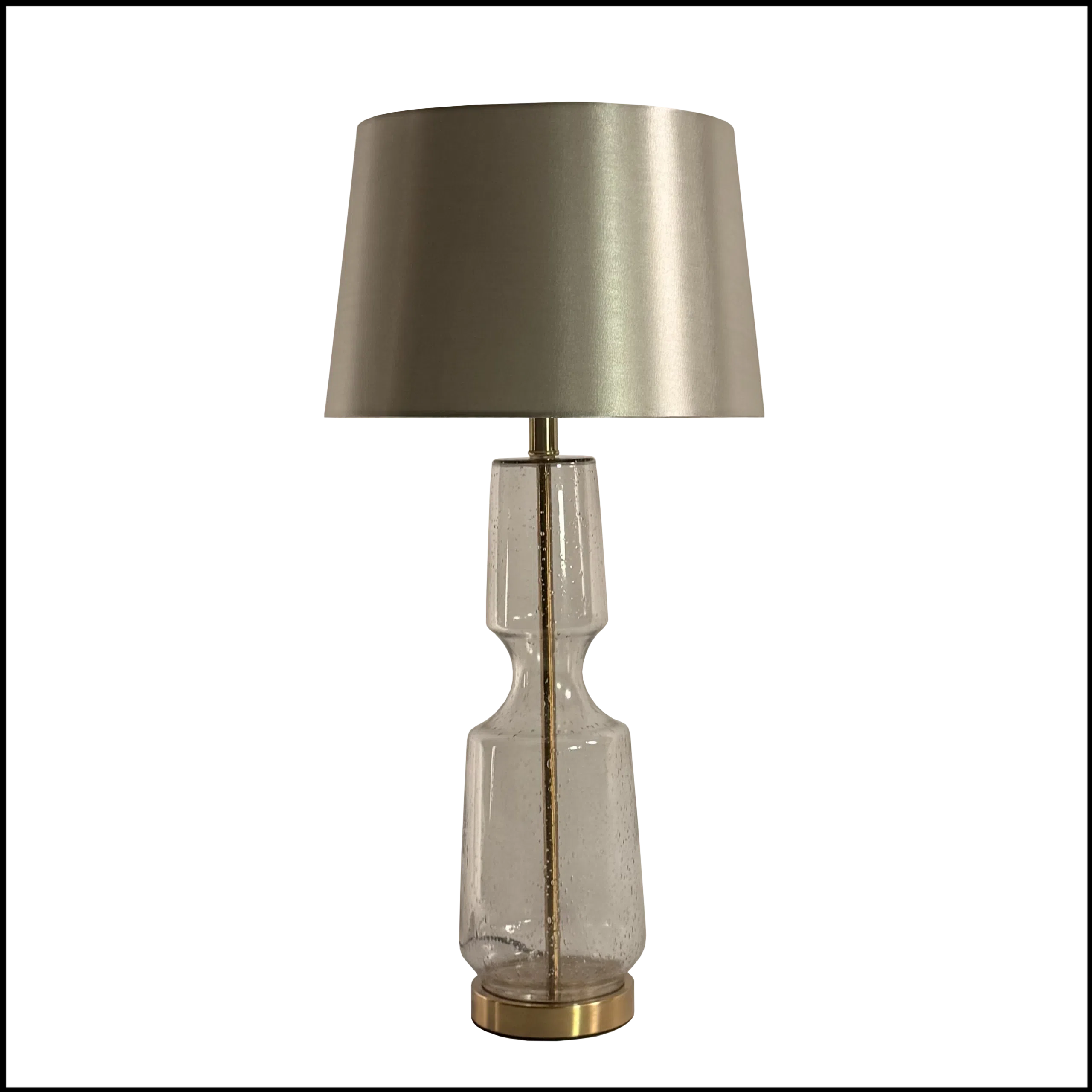 Abajur em vidro artesanal transparente, cada peça é única e exclusiva, com detalhes em metal bronze e pantalha opaca em tecido algodão mercerizado na cor prata brilhante